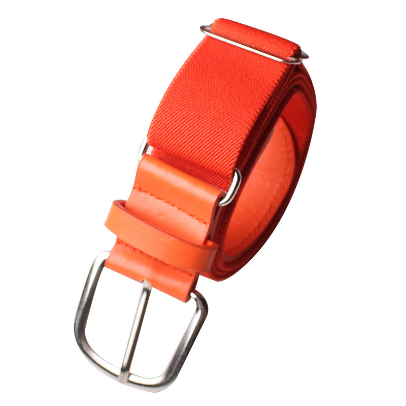 Orange belt with a silver buckle on a white background