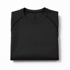 Folded black long sleeve compression shirt with crew neck and athletic seams