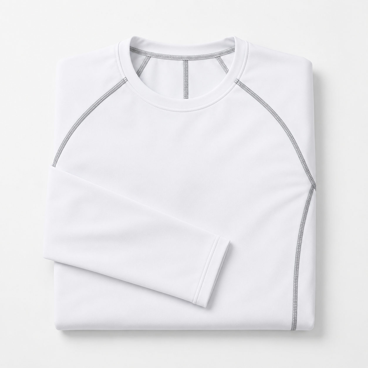 Folded white team compression shirt for custom athletic apparel orders