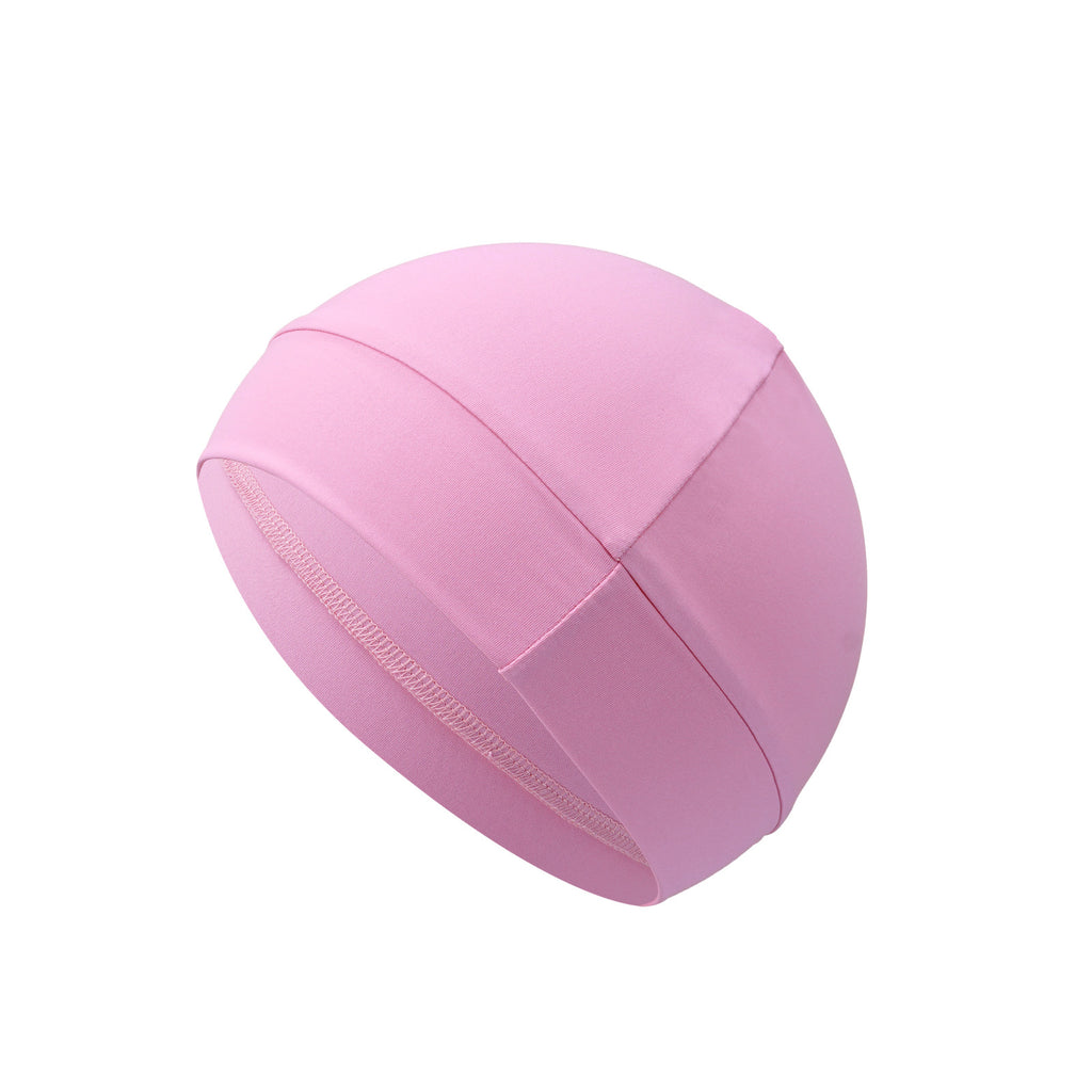 Pink swim cap on a white background