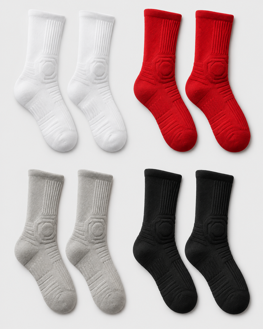 Set of white, red, gray, and black socks on a light gray background