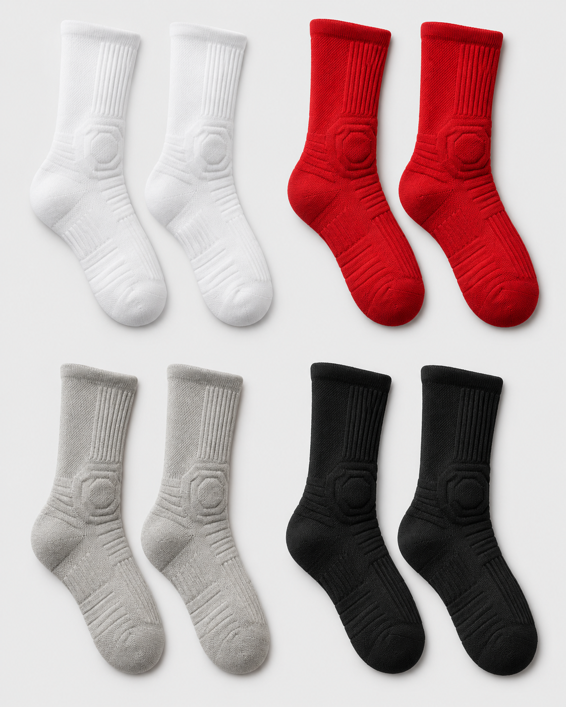 Set of white, red, gray, and black socks on a light gray background