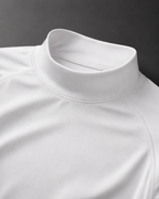 white short sleeve mock neck compression shirt in premium studio angled view